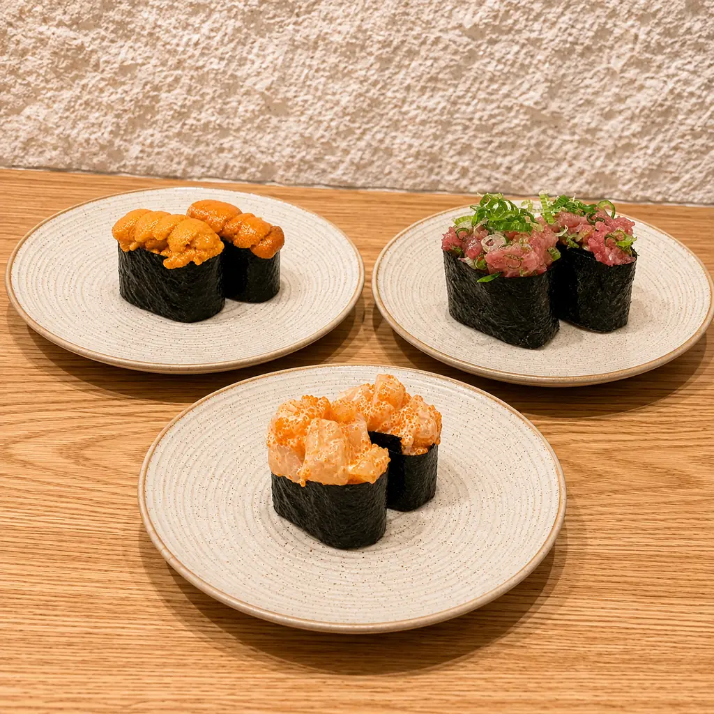 Nigiri portions shaped by deliberate knife direction and scoring